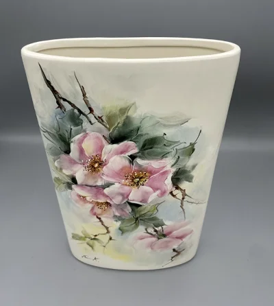 A flat-shaped vase with a wild rose motif