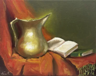 Copper vase and book