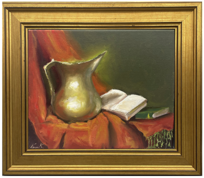 Copper vase and book
