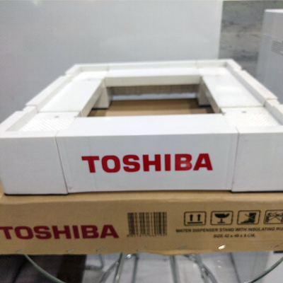 Toshiba vending machine stand with fire-resistant rubber pad, 42 x 40 x 9 cm.