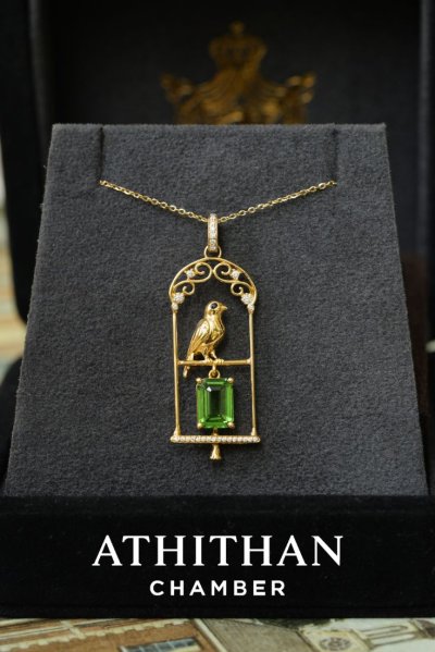 THE JEWEL KEEPER : Resting in Golden Cage Tsavorite Pendant