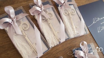 White tassel key opener