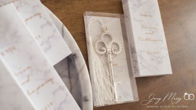 White tassel key opener