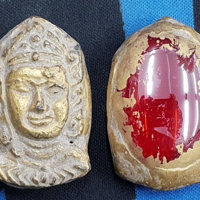 พระเจ้าอโศก หลังเม็ดพระธาตุ กรุดอยไซ