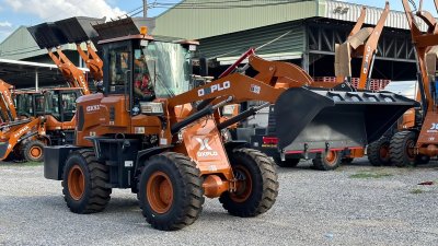 รถตักล้อยางรุ่น OX938