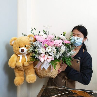 Pink flower basket with bear
