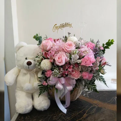 Pink flower basket with bear