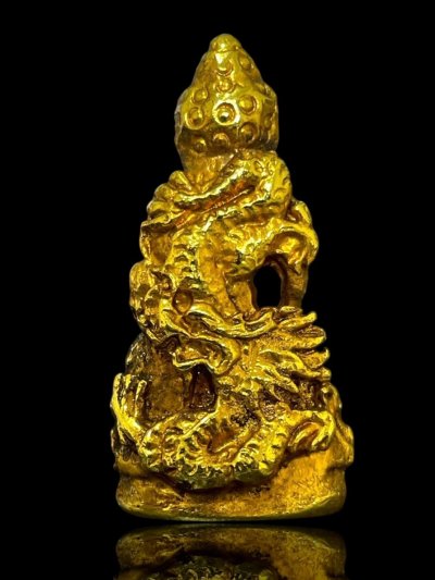 พระกริ่งปวเรศพิมพ์สมบูรณ์พูนสุข หลังมังกร ปี 2411 เนื้อกะไหล่ทอง