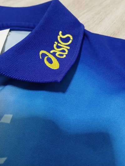 Used Asics shirt Size O C34/L29"