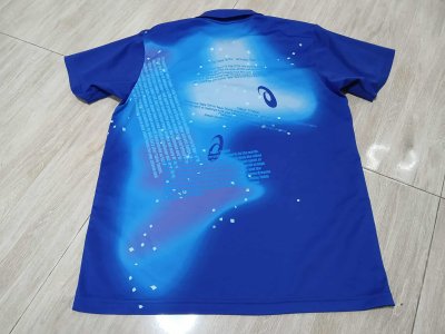 Used Asics shirt Size O C34/L29"