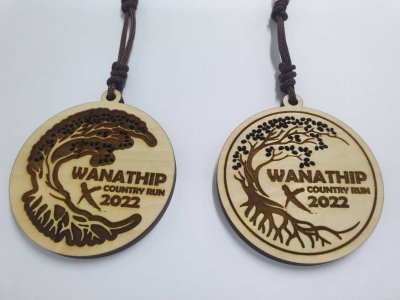 Wooden medal with acrylic size 7 cm.