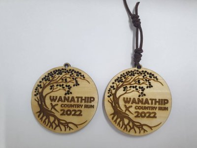 Wooden medal with acrylic size 7 cm.