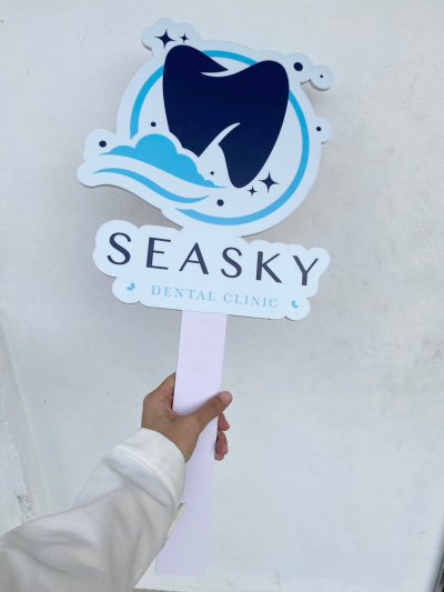 holding sign holding sign