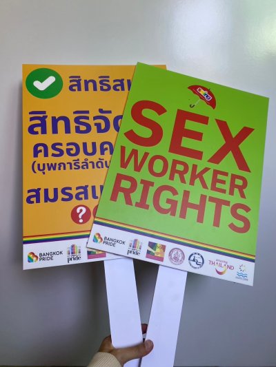 holding sign holding sign