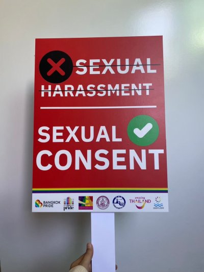 holding sign holding sign