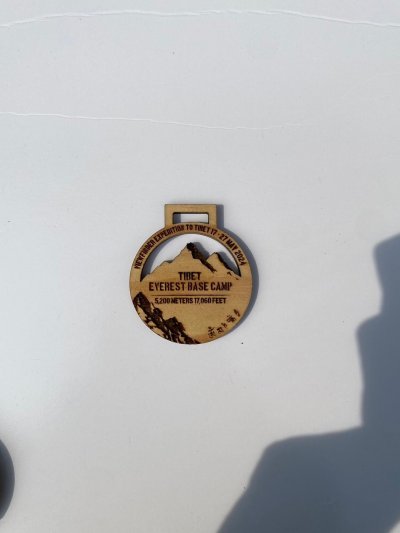 Wooden medal with acrylic size 7 cm.