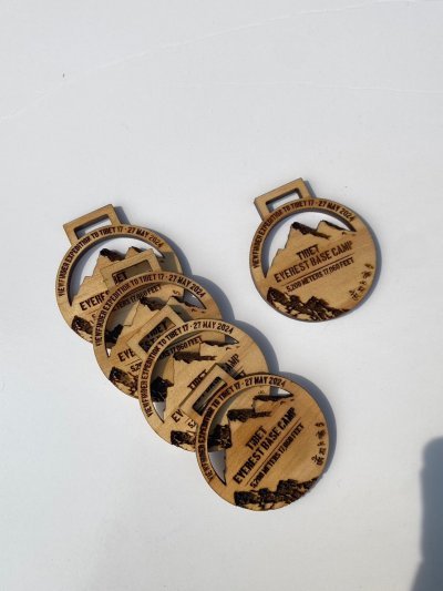 Wooden medal with acrylic size 7 cm.