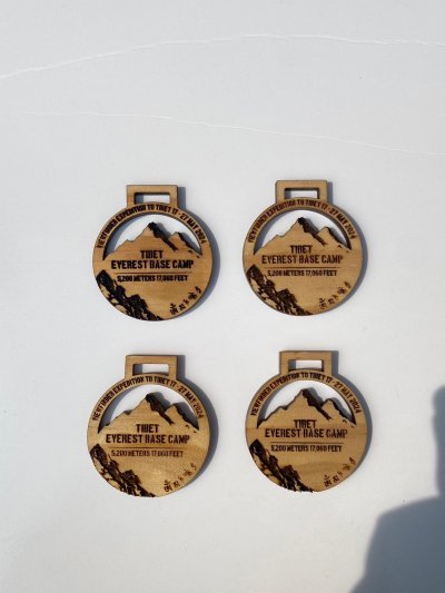 Wooden medal with acrylic size 7 cm.