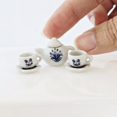 Handcrafted Miniature Ceramic Tea Set with Blue Floral Design