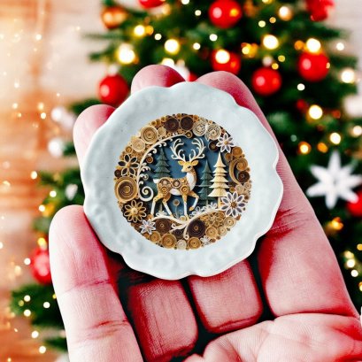 Handcrafted Christmas-themed miniature plate with intricate reindeer design, perfect for dollhouse holiday decor.