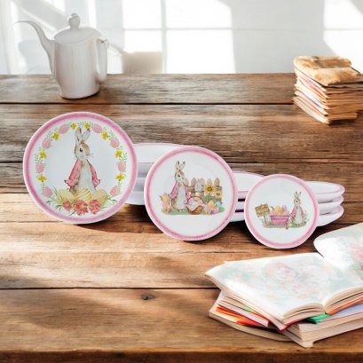 A charming 3-piece miniature plate set featuring Easter bunny designs with pastel pink borders, floral accents, and decorative eggs—perfect for dollhouse displays and festive decor.