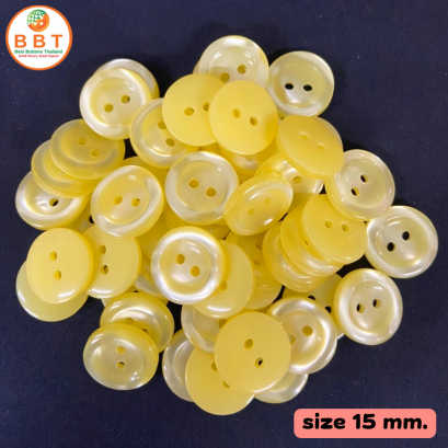 Pearl buttons shiny yellow size 15 mm.