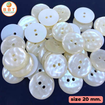 Shiny white pearl buttons, size 20 mm.