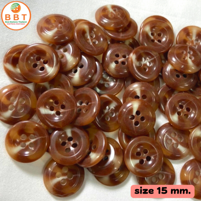 Button pouring brown and white tube, size 15 mm.