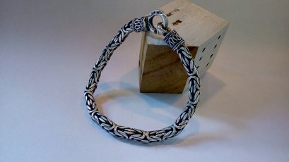 Silver wire wrapped pendant with leather necklace