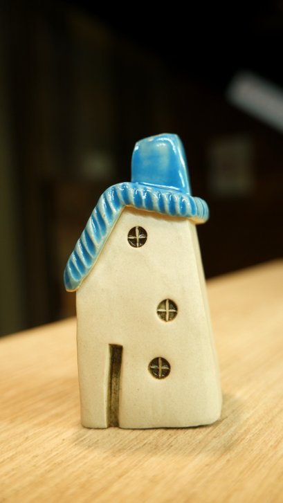 Ceramic house, blue roof