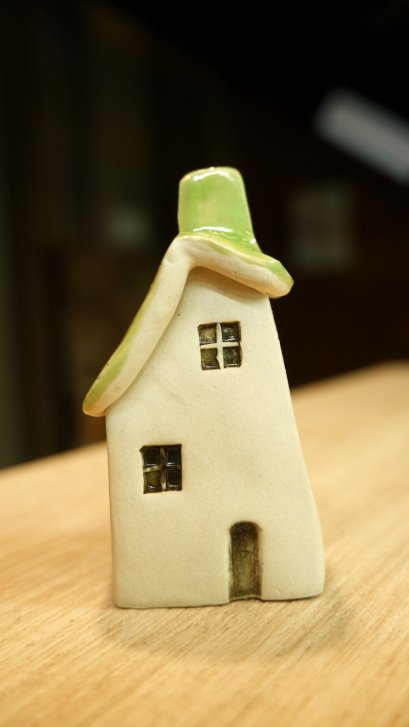 Ceramic house, green roof