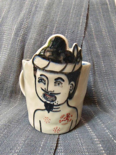 Hilltribe man earthenware mug