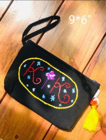 KiK embroidered hand bag