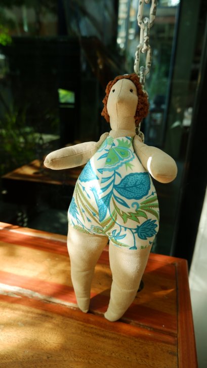 Doll with green dress