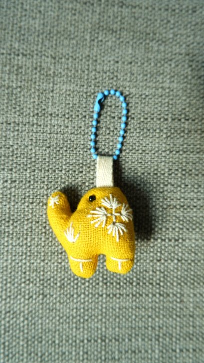 Yellow elephant keychain, light blue cord