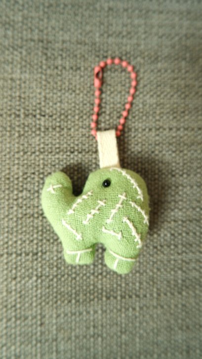 green elephant keychain, pink cord