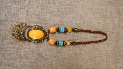 Wooden neclklace with yellow stone