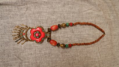 Wooden neclklace with stone orange flower
