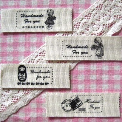 ป้ายผ้า Sue รวม 4 ลาย หน้ากว้าง 2.5 cm. ราคา/set