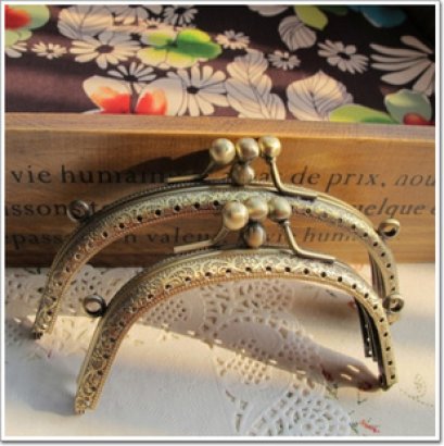 ปากกระเป๋าป๊อกแป๊กทรงกลม 2 ช่อง มี 2 ขนาด 10.5 cm., 14 cm.