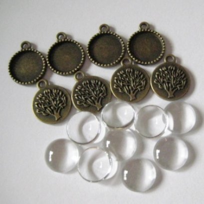 หัวซิปทองดำ พร้อมกระจก แบบกลมด้านหลังลายต้นไม้ ขนาด 14 mm. 8 ชุด/set