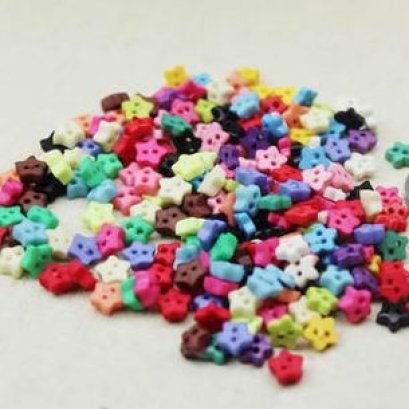 กระดุมดาวคละสี ขนาด 0.6 cm. 40 เม็ด/แพ็ค