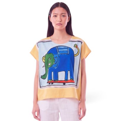 เสื้อปอนโชผู้หญิง - สีส้ม : ลายช้างน้อยเล่นสเก็ตบอร์ดบนผืนเหลือง
