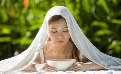 Cure nasal congestion by heating cover with herbs