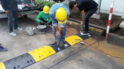Rubber Speed Hump Installation. 