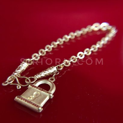 สร้อยข้อมือลายโซ่ทุบโปร่งห้อยกุญแจทองคำแท้ 96.5%