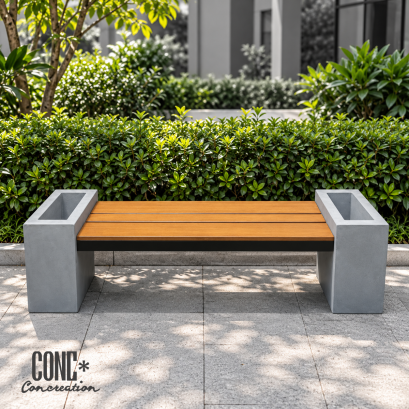 ม้านั่งสนามรุ่นบล็อคกระถางคู่ CONC Concreation สีไม้สัก ขนาด 170x45x45 ซม. ฐานปูนซีเมนต์สีเทาพร้อมช่องกระถางต้นไม้ทั้งสองด้าน วางบนพื้นคอนกรีตหน้าพุ่มไม้
