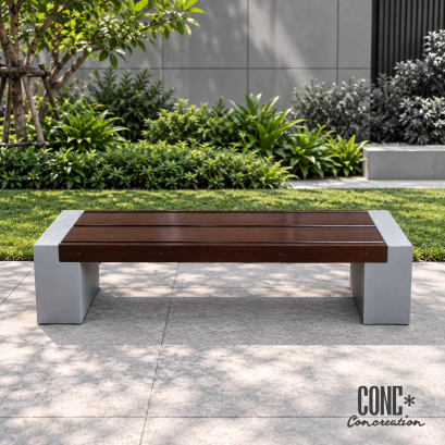 ม้านั่งสนามบล็อคระแนงเรียบ CONC Concreation สีไม้โอ๊คเข้ม ขนาด 170 ซม. ที่นั่งไม้ไฟเบอร์ซีเมนต์ CONWOOD ฐานปูนสีเทา วางบนลานทางเดินหน้าสวนสีเขียว
