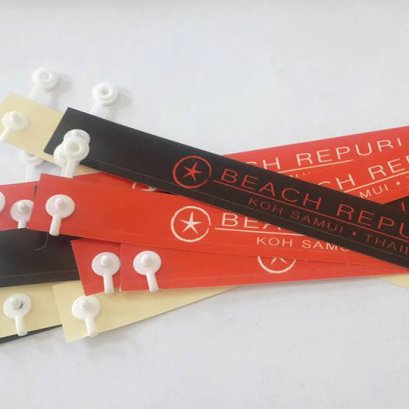 สายรัดข้อมือแบบกระดุม