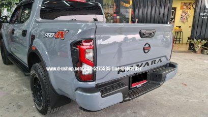 Black rear light cover, straight side, model Nissan Navara New 2021